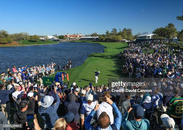 Rory McIlroy of Northern Ireland plays his tee shot on the 18th hole in the play-off with J.J.Spaun for THE PLAYERS Championship 2025 at TPC Sawgrass...