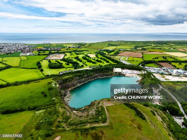 drone view of cornelly quarry in wales, uk - escarpment stock pictures, royalty-free photos & images