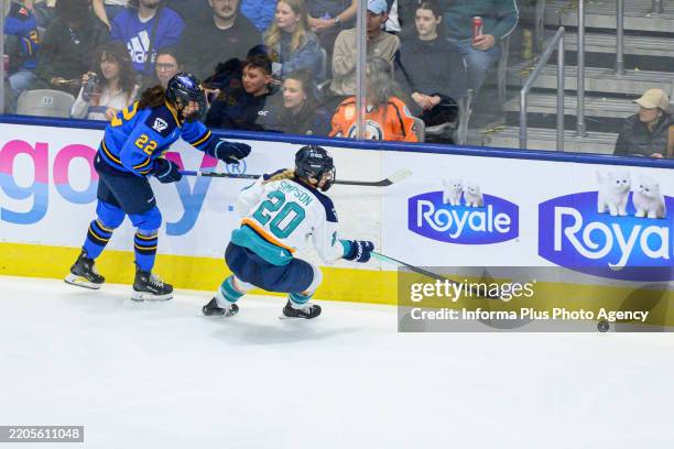 Maggie Connors forward of Toronto Sceptres and Allyson Simpson defender of New York Sirens battle for the puck during the Toronto Sceptres vs New...