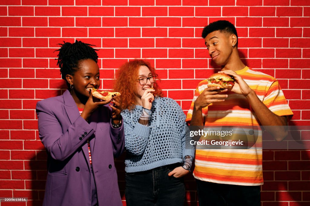 Friends Enjoying Fast Food Together