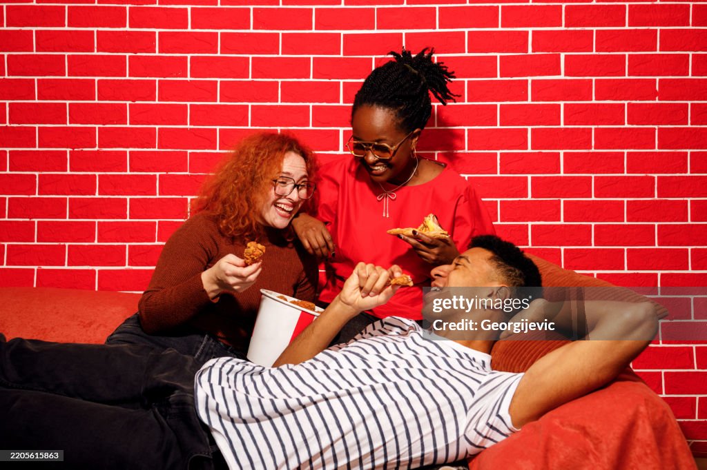 Friends Enjoying Fast Food Together