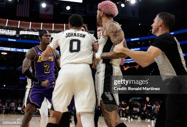 Jarred Vanderbilt of the Los Angeles Lakers and Jeremy Sochan of the San Antonio Spurs exchange words in the second half at Crypto.com Arena on March...