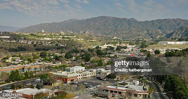 high angle view of downtown santa clarita housing with mountains beyond - santa clarita stock pictures, royalty-free photos & images