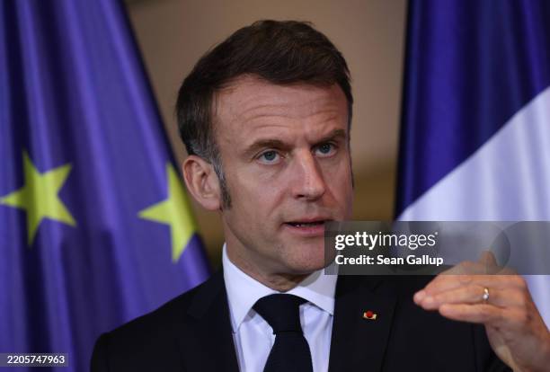French President Emmanuel Macron and German Chancellor Olaf Scholz speak to the media following talks at the Chancellery on March 18, 2025 in Berlin,...
