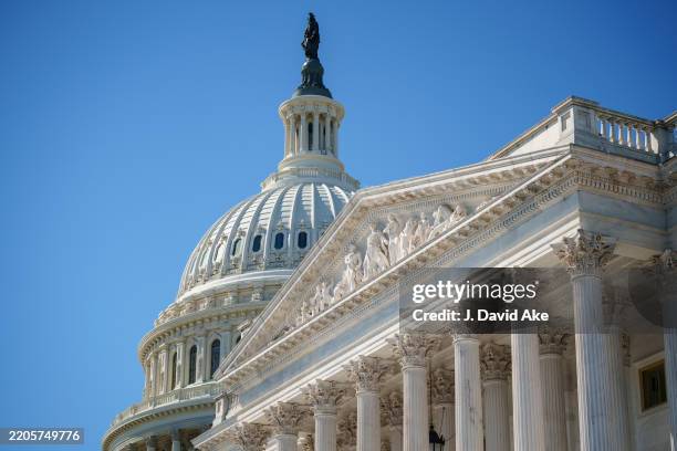 The U.S. Capitol Dome is seen behind the top of the entrance to the senate side of the Capitol on March 18 in Washington, DC.