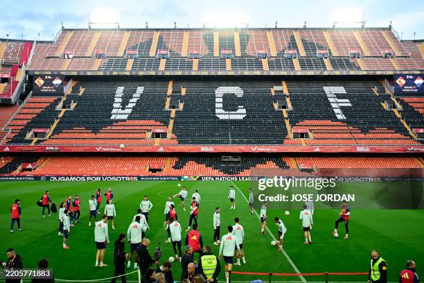 Spain players attend a training session ahead of the UEFA Nations League quarter final second leg football match between Spain and Netherlands at the...