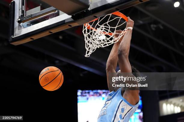 Ven-Allen Lubin of the North Carolina Tar Heels dunks the ball during the first half in the First Four game of the NCAA Men's Basketball Tournament...