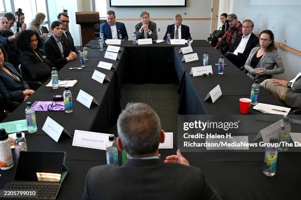 Senator John Hickenlooper listens to Greg Ebel, Sc.D. Lab Principal Investigator, Director, Center for Vector-Borne Infectious Diseases and Professor...