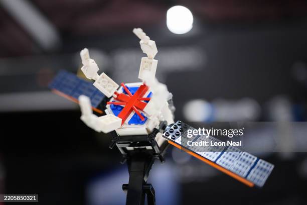 Model of the ClearSpace system, that is designed to grab and bring space debris into the atmosphere to burn up on re-entry, is displayed at the 2025...