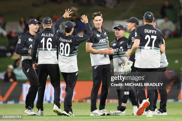 New Zealand's Will O'Rourke celebrates the wicket of Pakistan Mohammad Haris during the fourth Twenty20 international cricket match between New...