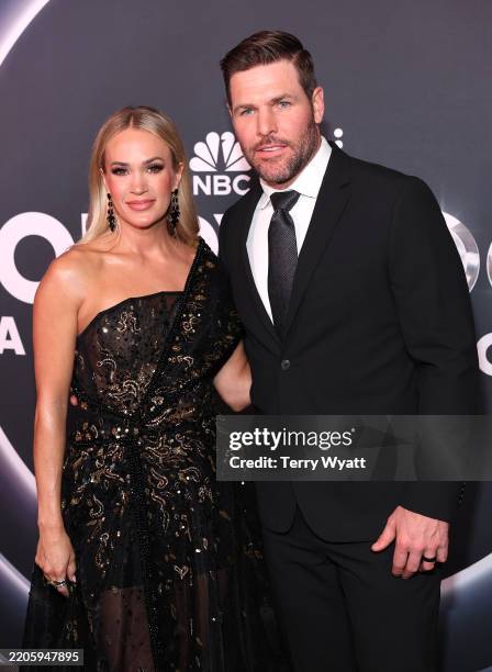 Carrie Underwood and Mike Fisher attend NBC's Opry 100: A Live Celebration at The Grand Ole Opry on March 19, 2025 in Nashville, Tennessee.