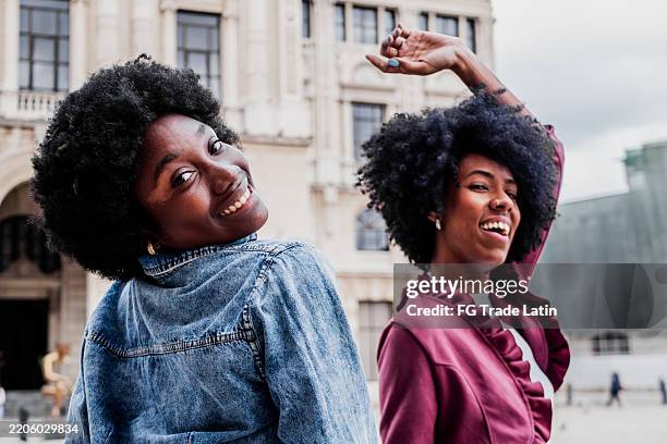 portrait of young friends women on the city - afro cuba stock pictures, royalty-free photos & images