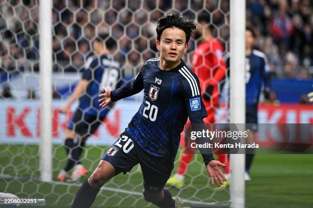Takefusa Kubo of Japan celebrates after scoring the team's second goal during the FIFA World Cup Asian qualifier Group C match between Japan and...