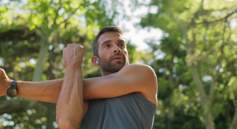 https://media.gettyimages.com/id/2206045762/video/outdoor-athlete-and-man-with-earphones-stretching-and-listening-to-music-for-fitness-and.jpg?b=1&s=640x640&k=20&c=rAah-cziybeRdDAM7YbM9EhWhCZ-oc7DQ5-wwEgbPG8=
