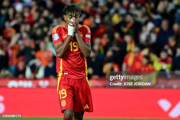 Spain's forward Lamine Yamal reacts to failing to score during the penalty shoot outduring the UEFA Nations League quarter final second leg football...