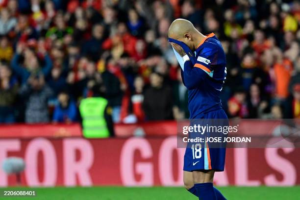 Netherlands' forward Donyell Malen reacts after failing to score during the penalty shoot out after the UEFA Nations League quarter final second leg...