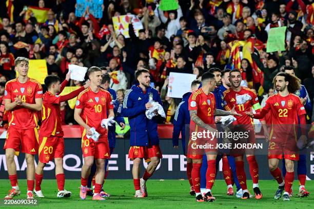 Spain's players celebrate after the UEFA Nations League quarter final second leg football match between Spain and Netherlands at the Mestalla stadium...