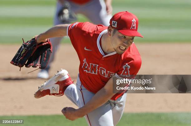 Yusei Kikuchi of the Los Angeles Angels pitches against the Colorado Rockies in a spring training baseball game in Scottsdale, Arizona, on March 21,...