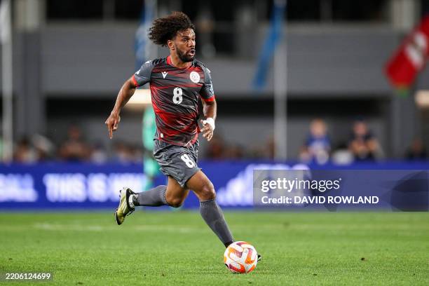 New Caledonia's Joris Kenon controls the ball during the FIFA World Cup 2026 Oceania qualifiers group final football match between New Zealand and...