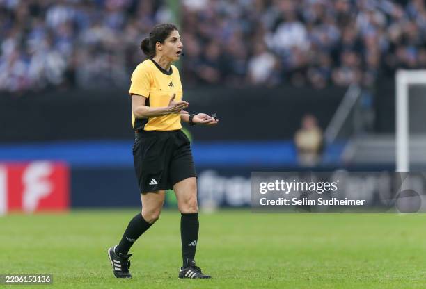 Referee Riem Hussein reacts during the Women's DFB Cup semifinal between Hamburger SV and SV Werder Bremen at Volksparkstadion on March 23, 2025 in...