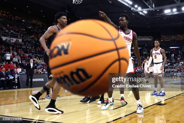 Sadiku Ibine Ayo of St. John's Red Storm gestures during the second half in the first round of the NCAA Men's Basketball Tournament against the Omaha...