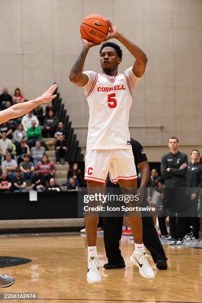 Cornell Big Red guard Jacob Beccles shoots the ball during the college basketball Ivy League Tournament semifinal game between the Cornell Big Red...