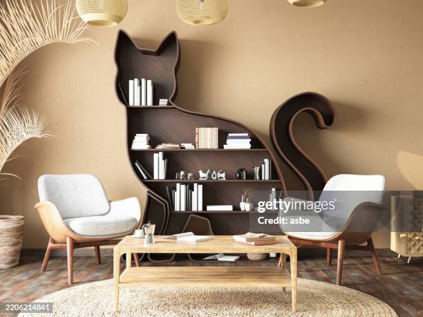 cat shaped bookshelf in a cozy room - book stack coffee stock pictures, royalty-free photos & images