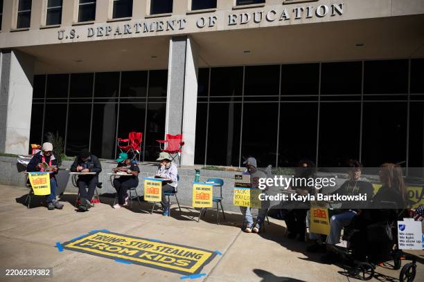 Protestors participate in a "study-in" in front of the U.S. Department of Education on March 21, 2025 in Washington, DC. U.S. President Donald Trump...
