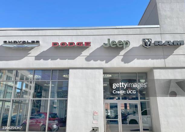 Chrysler, Dodge, Jeep, and Ram showroom, New York, NY. President Trump's proposed tariffs on imported cars and auto parts would increase production...