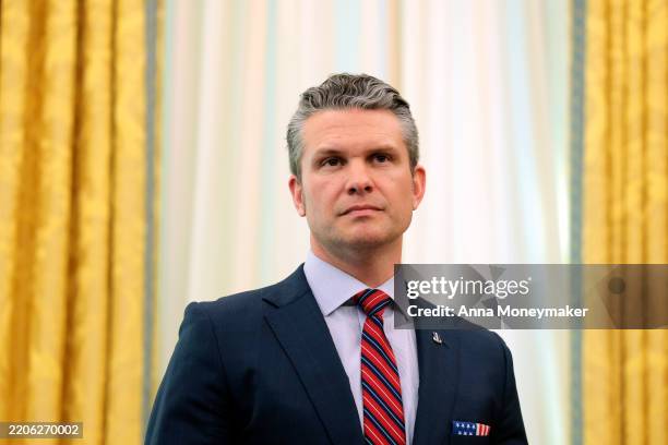 Secretary of Defense Peter Hegseth listens as U.S. President Donald Trump delivers remarks in the Oval Office of the White House on March 21, 2025 in...