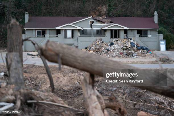 Storm damaged apartment in a landscape scarred by Hurricane Helene on March 24, 2025 near Swannanoa, North Carolina. Nearly six months after the...