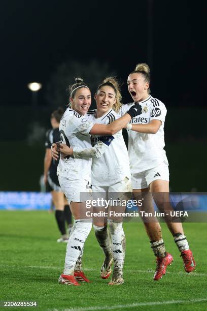 Athenea of Real Madrid celebrates with her teammates Olga Carmona and Irune Dorado after scoring her team's second goal during the UEFA Women's...