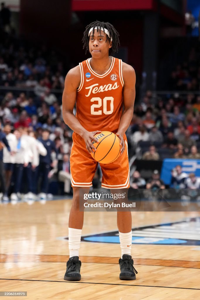 Tre Johnson of the Texas Longhorns attempts a free throw in the... News