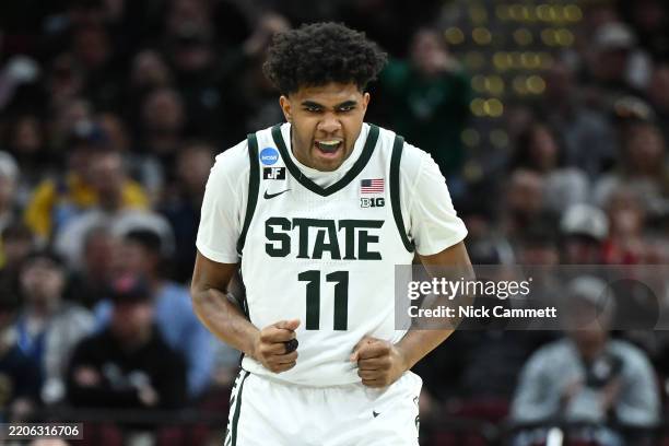 Jase Richardson of the Michigan State Spartans celebrates after his three-point basket against the Bryant University Bulldogs during the second half...