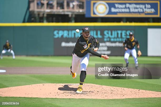 Paul Skenes of the Pittsburgh Pirates throws a pitch during the fourth inning of a spring training game against the New York Yankees at LECOM Park on...