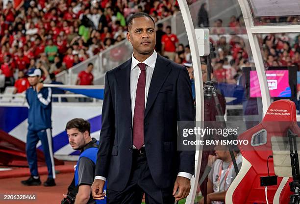 The Indonesian team coach Patrick Kluivert watches during the World Cup 2026 Asian qualifier football match between Indonesia and Bahrain at Bung...
