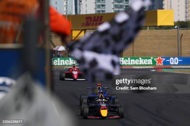 Race winner Alisha Palmowski of Great Britain and Campos Racing leads Second placed Chloe Chambers of United States and Campos Racing and Third...