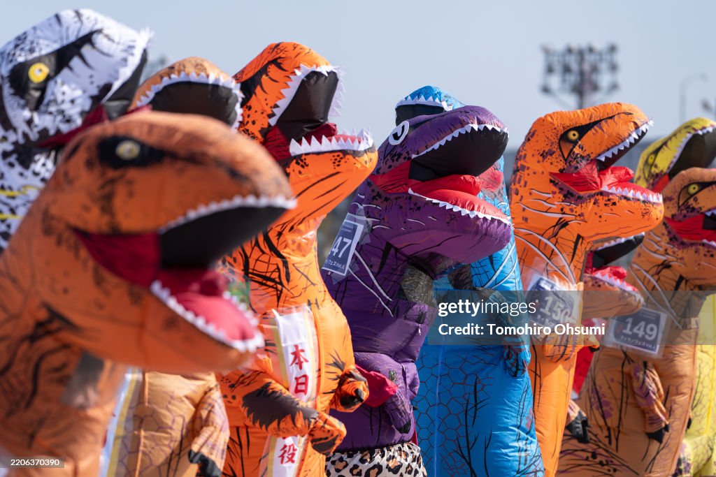 Toa Dinosaur Races People dressed as tyrannosauruses compete during a Tyrannosaurus Race ...