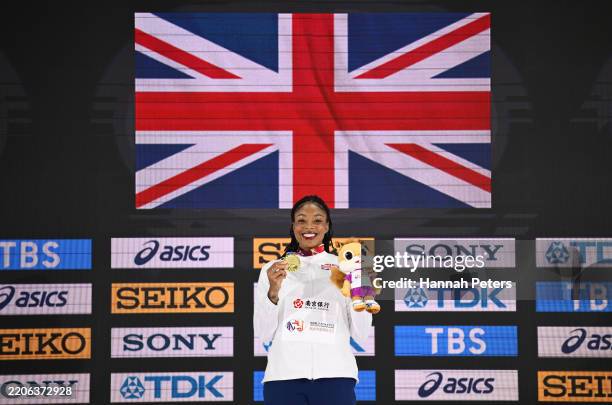 Gold medalist Amber Anning of Team Great Britain poses for a photo on the podium during the medal ceremony after the Women's 400m Final on day two of...