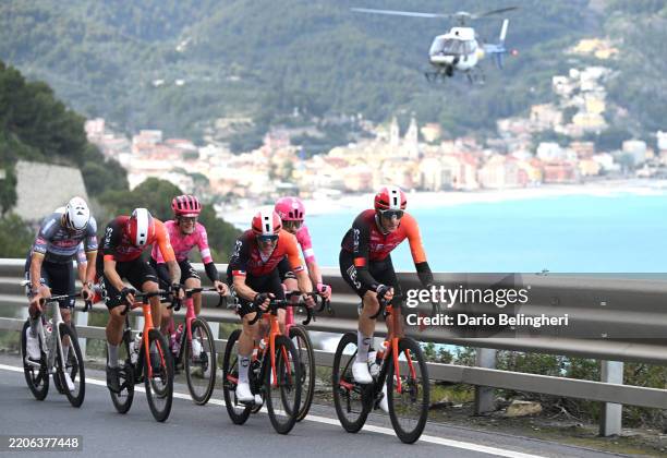 Filippo Ganna of Italy, Ben Swift of United Kingdom and Ben Turner of United Kingdom and Team INEOS Grenadiers lead the peloton during the 116th...