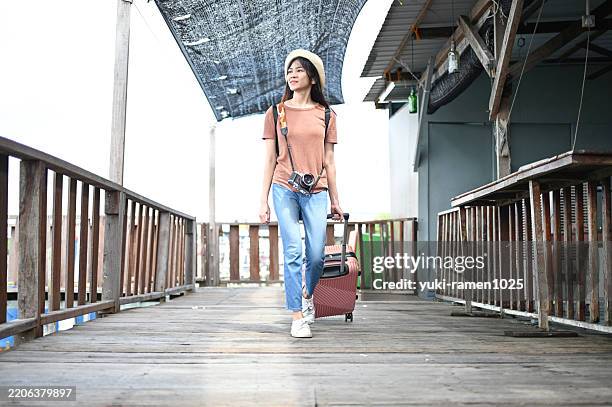 a solo traveler’s day in a seaside village - old wooden boats for free stock pictures, royalty-free photos & images