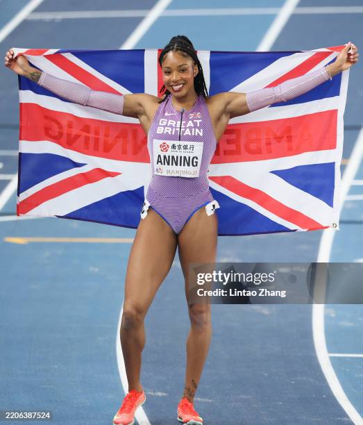 First placed Amber Anning of Team Great Britain celebrates after winning the Women's 400m Final on day two of the World Athletics Indoor...