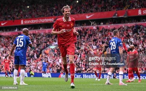 Peter Crouch of Liverpool Legends celebrates scoring his team's second goal during the Legends Charity Match between Liverpool Legends and Chelsea...