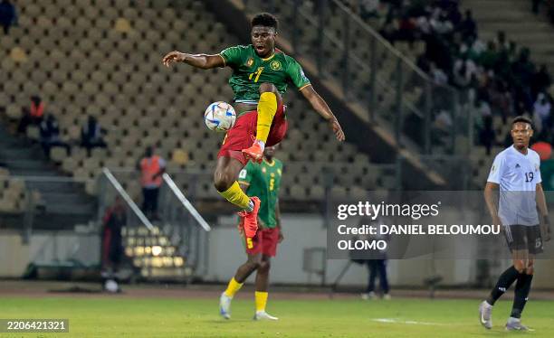 Cameroon's midfielder Carlos Baleba controls the ball during the FIFA World Cup 2026 Africa qualifiers group D match between Cameroon and Libya at...