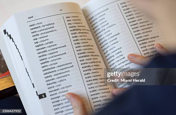 Andrii Kudrynskyi a 7th grader from Ukraine, uses a Ukrainian word-to-word bilingual dictionary in his ESOL class at Aventura Waterways K8 Center on...