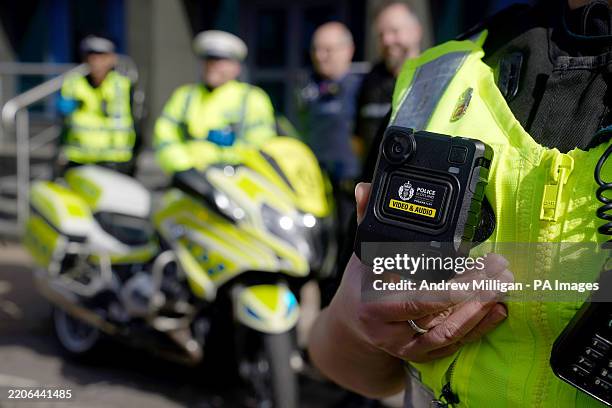 Body-worn video camera is held during the Police Scotland national launch of body-worn video cameras at Dundee Police Station. Picture date:...