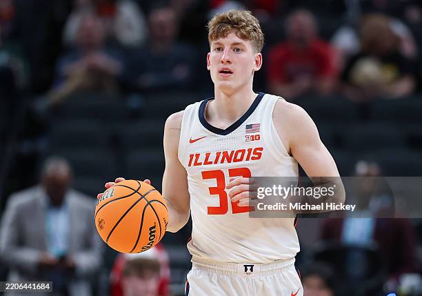 Kasparas Jakucionis of the Illinois Fighting Illini brings the ball up court during the game against the Iowa Hawkeyes in the Big Ten Men's...