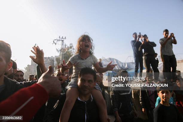 Palestinians chant slogans during an anti-Hamas protest, calling for an end to the war with Israel, in Beit Lahia in the northern Gaza Strip on March...