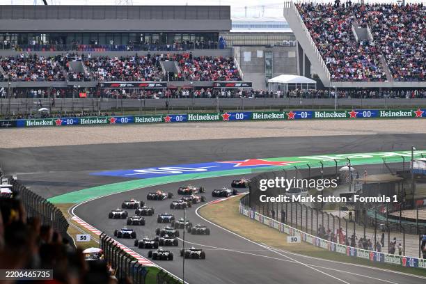 Oscar Piastri of Australia driving the McLaren MCL39 Mercedes leads George Russell of Great Britain driving the Mercedes AMG Petronas F1 Team W16...