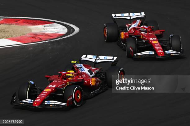 Lewis Hamilton of Great Britain driving the Scuderia Ferrari SF-25 leads Charles Leclerc of Monaco driving the Scuderia Ferrari SF-25 on track during...